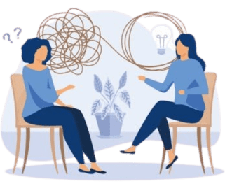 A therapist sitting at a table with a young person and an adult, engaged in a conversation.